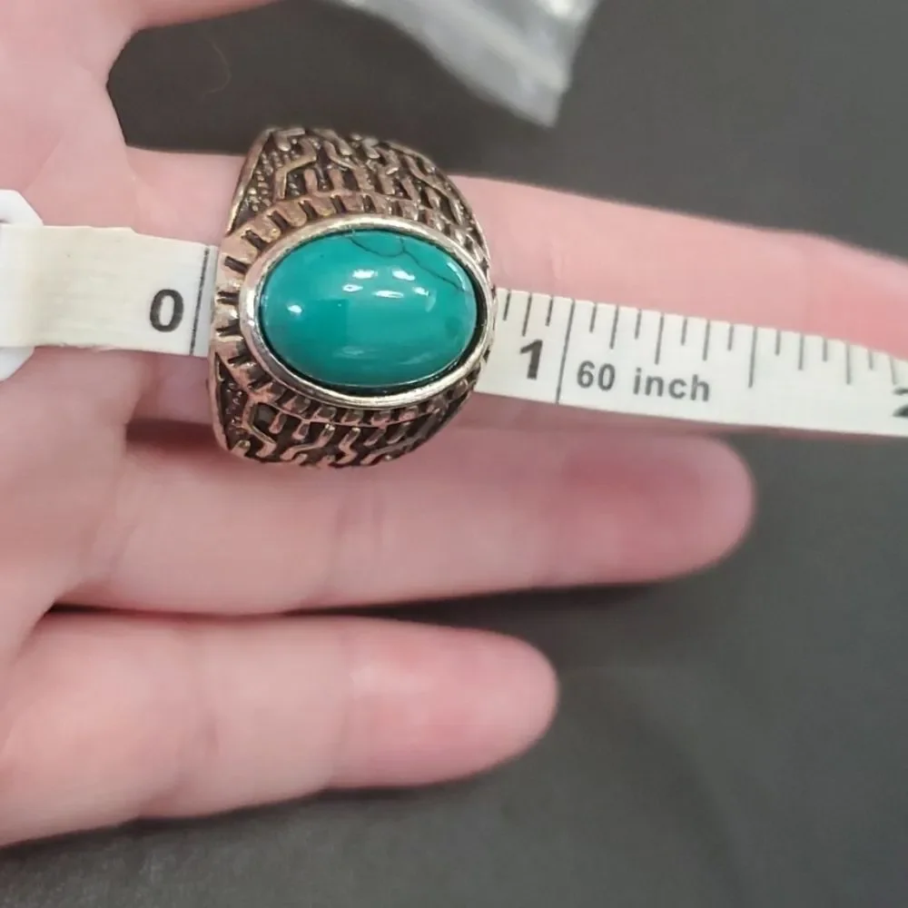 Silver tone ring with blue size 10.25